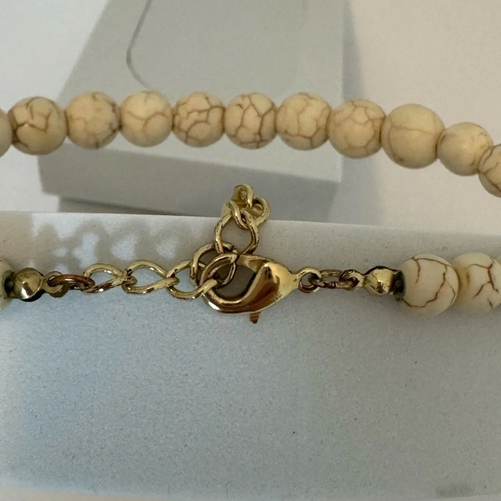 Gorgeous earth tone beaded necklace with brown floral accents